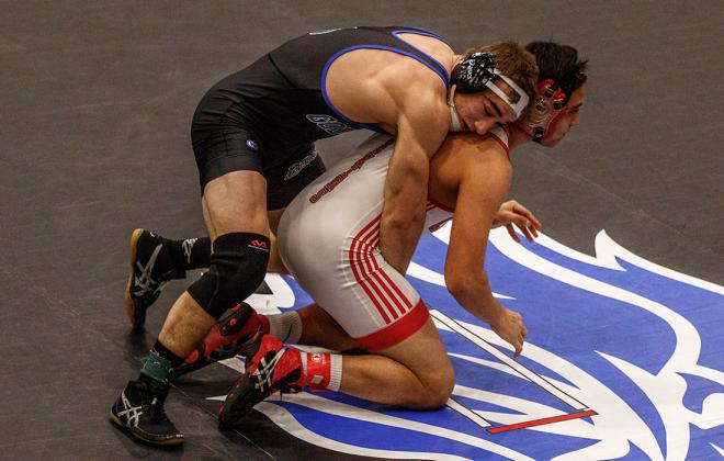 Goddard senior Troy Fisher used two pins and an 11-3 major decision to earn another regional championship. (Photo by Wendy Morrow)