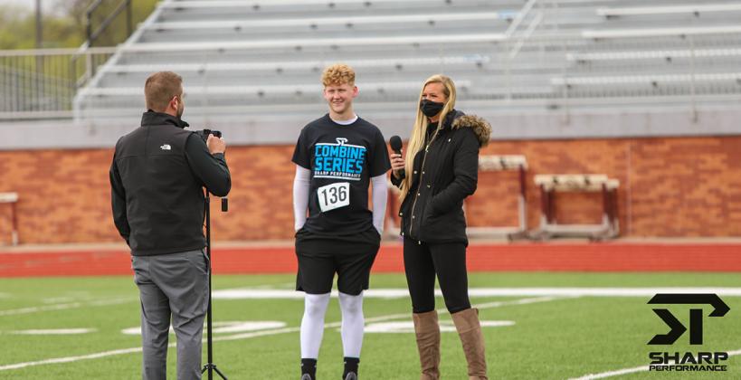 Hutch Trinity athlete Walt Gray - who will play football and attend school at Bishop Carroll this fall - is interviewed by Chet Kuplen and Bethany Bowman of Sports in Kansas at Saturday's Sharp Performance Combine. (Photo by Rayne Schmidtberger)