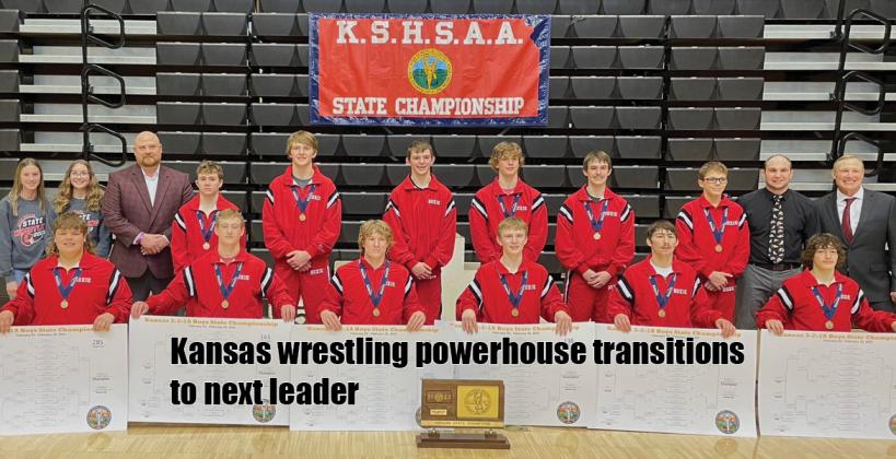 After winning the last four 3-2-1A state titles veteran Hoxie coach Mike Porsch (far right) has decided to hand the reins of the program to Ryan Etherton (standing next to Porsch). Porsch led the Indians to one of the most successful four-year stretches for any sport in Kansas, including a 60-point margin of victory over Norton in February. The 2023 Hoxie team destroyed the state record for team points at the 3-2-1A championship scoring 260 to runner-up Norton's 101.5. (Photo: Hoxie Wrestling Twitter/X)