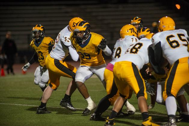 Wichita Northwest defensive end Marcus Hicks (#99), part of our "On the Front Lines" feature in 2017 and last year's "Recruiting Kansas" feature, committed to the University of Oklahoma during the Early Signing Period. Hicks is also one of the top wrestlers and throwers in the Kansas. (Photo by Linda Gregory) Wichita Northwest defensive end Marcus Hicks (#99), part of our "On the Front Lines" feature in 2017 and last year's "Recruiting Kansas" feature, committed to the University of Oklahoma during the Early Signing Period. Hicks is also one of the top wrestlers and throwers in the Kansas. (Photo by Linda Gregory)