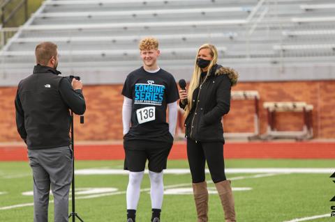 Hutch Trinity athlete Walt Gray - who will play football and attend school at Bishop Carroll this fall - is interviewed by Chet Kuplen and Bethany Bowman of Sports in Kansas at Saturday's Sharp Performance Combine. (Photo by Rayne Schmidtberger)