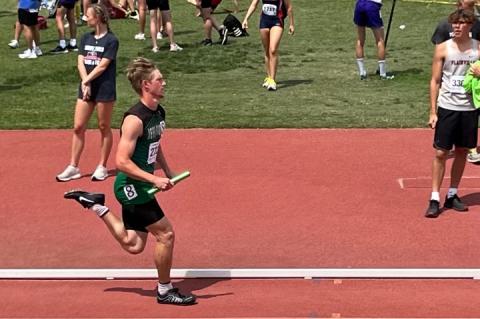 Jefferson County North's Isaac Kane runs a leg of a Charger relay. (Photo: Submitted)